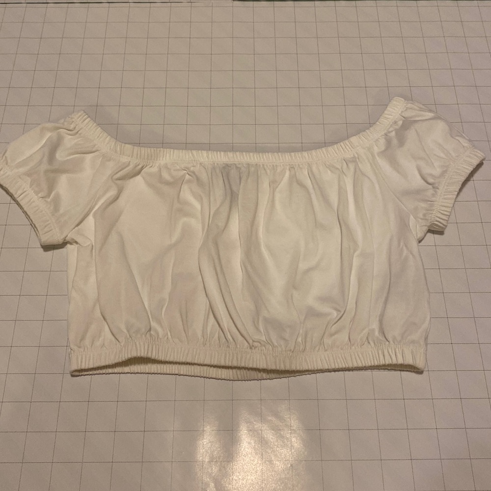 White, puffy cropped, off the shoulder top (can also be worn on shoulder)